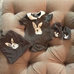 Victoria Beckham rabbit onesie and shoes